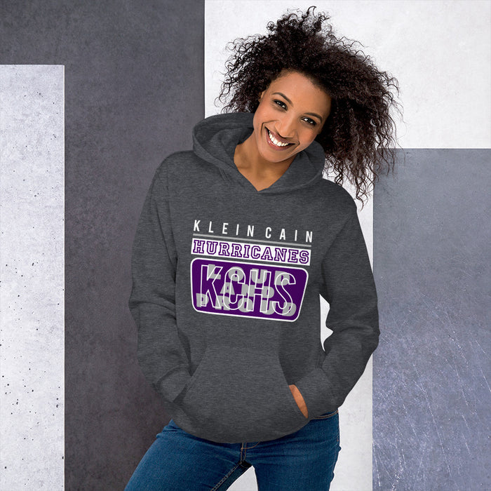 Woman wearing a Klein Cain High School Hurricanes Dark Heather Classic Hoodie 86