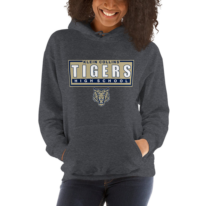 Woman wearing a Klein Collins High School Tigers Dark Heather Classic Unisex Hoodie 49