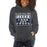 Woman wearing a Klein Collins High School Tigers Dark Heather Classic Unisex Hoodie 86