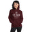 Woman wearing Cy-Fair High School Bobcats Maroon Classic Unisex Hoodie 217