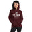 Woman wearing Cy-Fair High School Bobcats Maroon Classic Unisex Hoodie 217