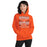 Woman wearing Seven Lakes High School Spartans Orange Classic Unisex Hoodie 237
