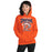 Woman wearing Seven Lakes High School Spartans Orange Classic Unisex Hoodie 213