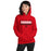 Woman wearing a Tomball High School Cougars Red Classic Unisex Hoodie 49