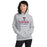 Woman wearing Tompkins High School Falcons Grey Classic Unisex Hoodie 217