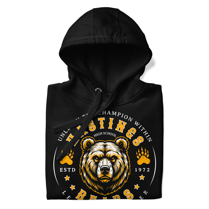 A close-up picture of a black hoodie with the Hastings High School Bears logo folded neatly. This hoodie features design #214