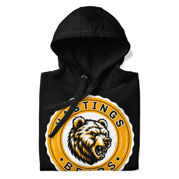 A close-up picture of a black hoodie with the Hastings High School Bears logo folded neatly. This hoodie features design #216