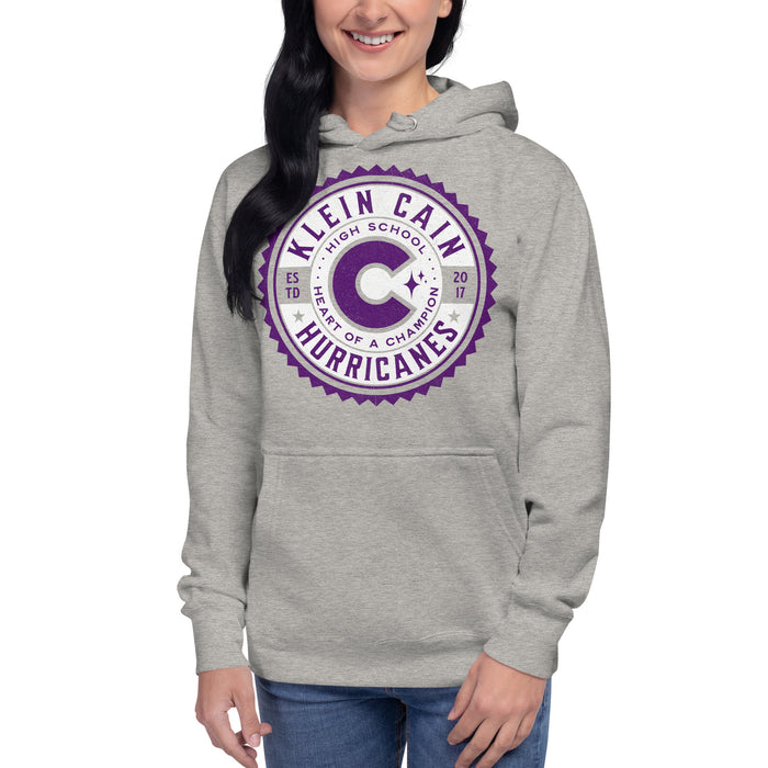 Woman wearing a Klein Cain High School Hurricanes Premium Carbon Grey Hoodie 215