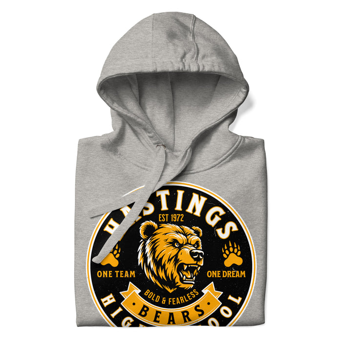 A close-up picture of a carbon grey hoodie with the Hastings High School Bears logo folded neatly. This hoodie features design #215