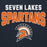 A dark navy graphic design featuring the words 'SEVEN LAKES SPARTANS' in distressed white and orange lettering, with a Spartan helmet logo below. Seven Lakes High School Spartans Navy Blue Premium Unisex Hoodie 234