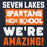A graphic design with the text 'SEVEN LAKES SPARTANS HIGH SCHOOL WE'RE AMAZING!' in distressed white and orange lettering on a dark navy background. Seven Lakes High School Spartans Navy Blue Premium Unisex Hoodie 231