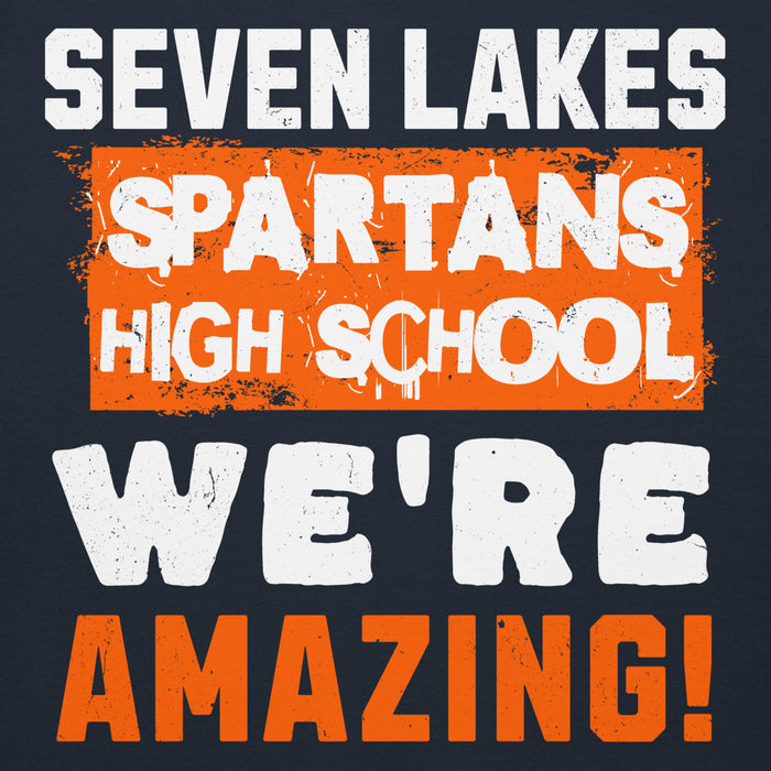 A graphic design with the text 'SEVEN LAKES SPARTANS HIGH SCHOOL WE'RE AMAZING!' in distressed white and orange lettering on a dark navy background. Seven Lakes High School Spartans Navy Blue Premium Unisex Hoodie 231