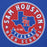 A circular red, white, and blue graphic reading 'SAM HOUSTON TEXANS HIGH SCHOOL' with a blue outline of Texas and 'SH' in the center, shown on a solid blue background. Sam Houston High School Texans Royal Blue Premium Unisex Hoodie 215
