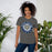 Woman wearing a Klein Collins High School Tigers Premium Asphalt T-shirt 02