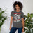 Woman wearing North Shore High School Mustangs Dark Grey Premium Unisex T-shirt 205