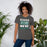 Woman wearing Reagan High School Rattlers Dark Grey Premium Unisex T-shirt 231