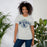 Woman wearing Cypress Ridge High School Rams Athletic Heather Premium Unisex T-shirt 211