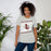 Woman wearing Lewisville High School Farmers Grey Premium Unisex T-shirt 223