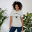 Woman wearing Permian High School Panthers Grey Premium Unisex T-shirt 211