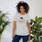 Woman wearing Round Rock High School Dragons Grey Premium Unisex T-shirt 217
