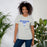 Woman wearing Taylor High School Mustangs Grey Premium Unisex T-shirt 017
