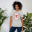 Woman wearing Tomball High School Cougars Grey Premium Unisex T-shirt 207