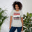Woman wearing Tomball High School Cougars Grey Premium Unisex T-shirt 227
