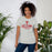 Woman wearing Tomball High School Cougars Grey Premium Unisex T-shirt 202