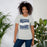 Woman wearing Tomball Memorial High School Wildcats Grey Premium Unisex T-shirt 227