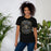 Woman wearing Cypress Park High School Tigers Black Premium Unisex T-shirt 207