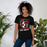 Woman wearing Lake Travis High School Cavaliers Black Premium Unisex T-shirt 205