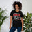 Woman wearing Langham Creek High School Lobos Black Premium Unisex T-shirt 213