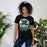 Woman wearing Reagan High School Rattlers Black Premium Unisex T-shirt 202