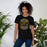 Woman wearing Klein Oak High School Panthers Premium Black Unisex T-shirt 207