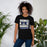 Woman wearing Hebron High School Hawks Black Premium Unisex T-shirt 235