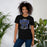 Woman wearing Hebron High School Hawks Black Premium Unisex T-shirt 213