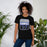 Woman wearing Hebron High School Hawks Black Premium Unisex T-shirt 001