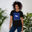 Woman wearing New Caney High School Eagles Black Premium Unisex T-shirt 236