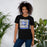 Woman wearing New Caney High School Eagles Black Premium Unisex T-shirt 235