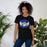 Woman wearing New Caney High School Eagles Black Premium Unisex T-shirt 242