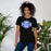 Woman wearing New Caney High School Eagles Black Premium Unisex T-shirt 011