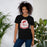 Woman wearing Odessa High School Bronchos Black Premium Unisex T-shirt 219