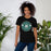 Woman wearing Reagan High School Rattlers Black Premium Unisex T-shirt 239
