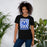Woman wearing Taylor High School Mustangs Black Premium Unisex T-shirt 226
