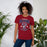 Woman wearing Tompkins High School Falcons Cardinal Red Premium Unisex T-shirt 213