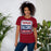 Woman wearing Tompkins High School Falcons Cardinal Red Premium Unisex T-shirt 001