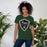 Woman wearing Reagan High School Rattlers Dark Green Premium Unisex T-shirt 225