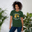 Woman wearing Klein Forest High School Golden Eagles Premium Forest Green Unisex T-shirt 228