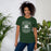 Woman wearing Reagan High School Rattlers Forest Green Premium Unisex T-shirt 207