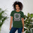 Woman wearing Reagan High School Rattlers Forest Green Premium Unisex T-shirt 226